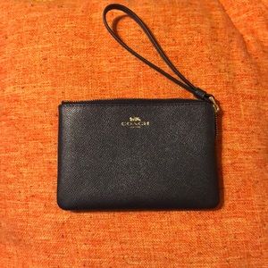 NWT.  Authentic Coach Wristlet navy blue